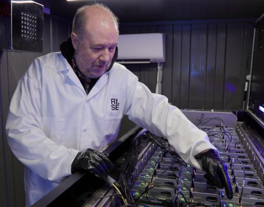Prof. Jon Summers checking the liquid cooling of the servers
