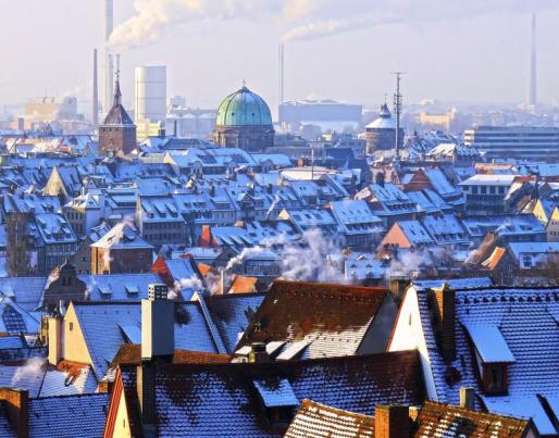 Winter in town with snow on roofs