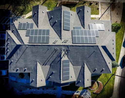 Roof of residential building equipped with solar panels