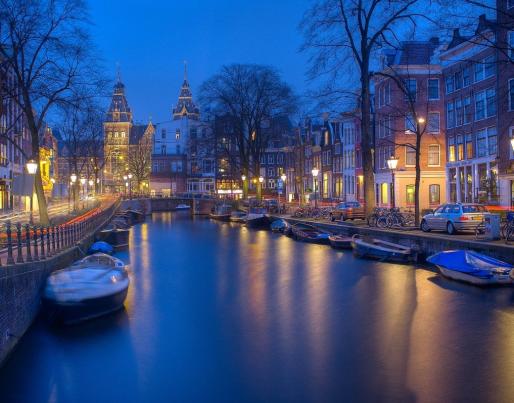 City of Amsterdam with canal during the night