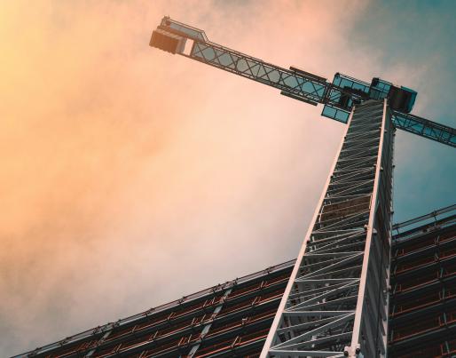 a crane near a building under construction