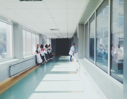 People in an hospital corridor