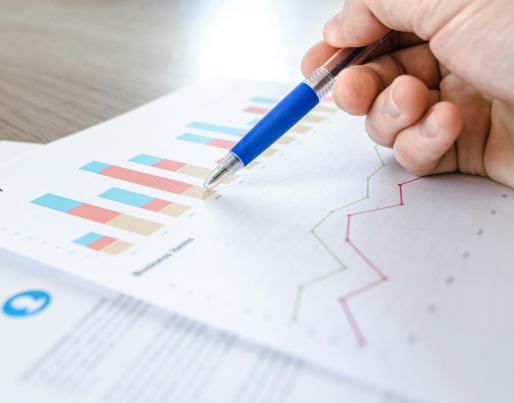 A sheet with graphs and arrow
