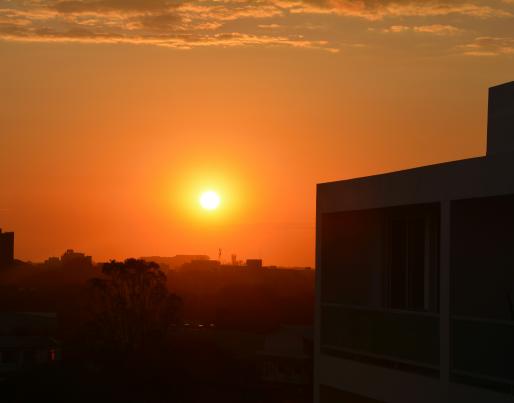 Sun setting over a city