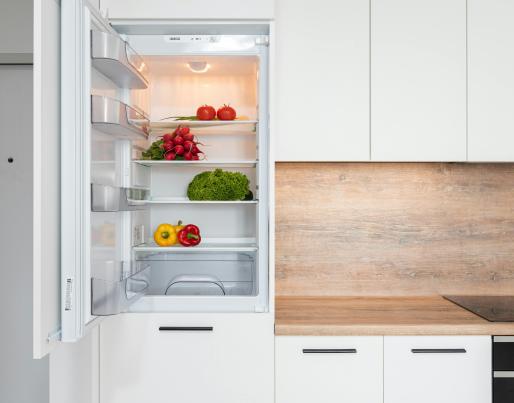A fridge with vegetables