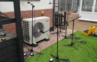 Microphones recording the noises from a heat pump