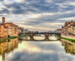 Old buildings next to Arno river
