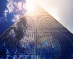 Skyscraper facade illuminated by the sun 