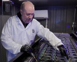 Prof. Jon Summers checking the liquid cooling of the servers