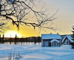 Winter landscape and a house