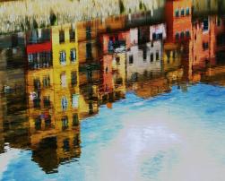 Girona, Spain reflected onto water