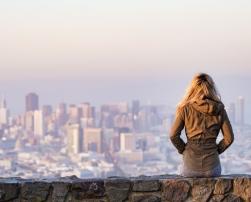 Woman watching a city panorama