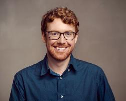 A profile picture of Fintan Burke, smiling at the camera 
