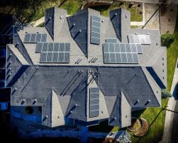 Roof of residential building equipped with solar panels