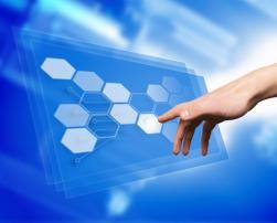 Hand touching an interactive screen