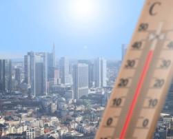 Hot temperature and city behind