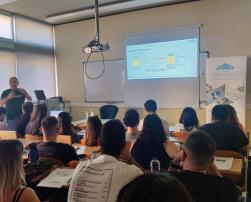 Stefan Pallantzas,HPHI, delivering an UPGREAT seminarto university students in NKUA's premises, Athens,Greece.