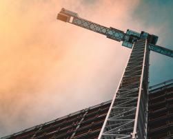 a crane near a building under construction