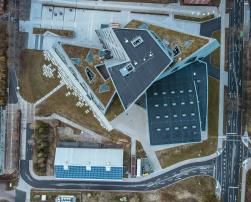 A building with photovoltaic panels on the roof