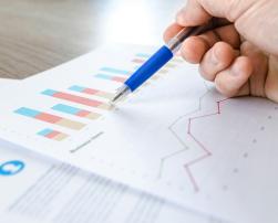 A sheet with graphs and arrow